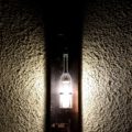 Wandleuchte Flasche beleuchet